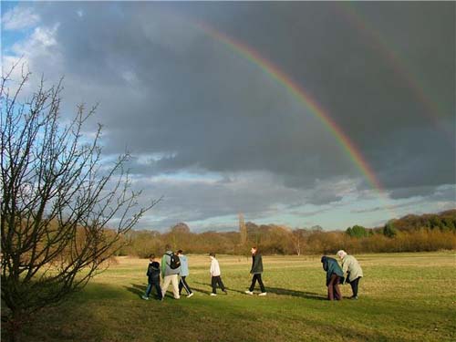 going for a walk under a rainbow
